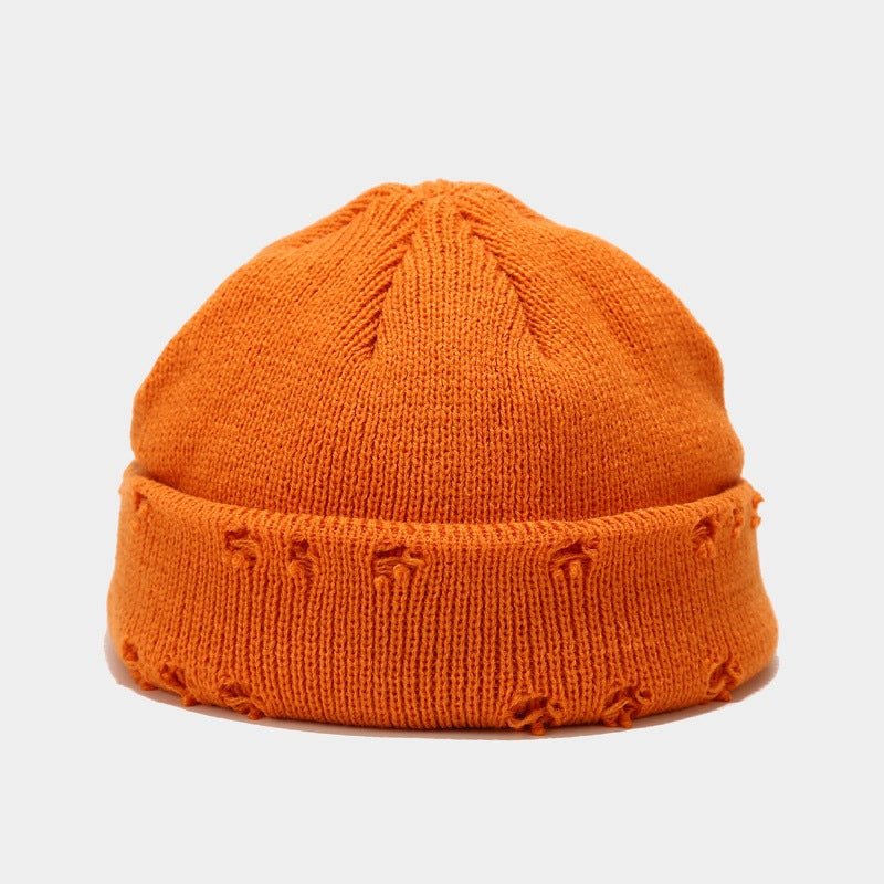 Chic and Cozy: Hole-Knitted Wool Hat for Effortless Style