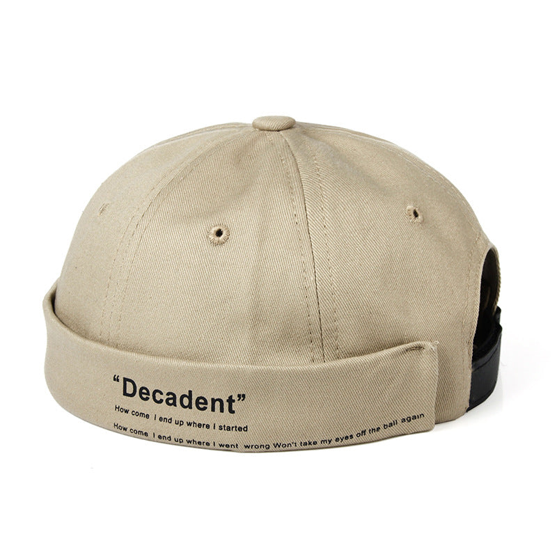 "Sleek Dome Rimless Melon Leather Hat: Contemporary Elegance for Every Occasion